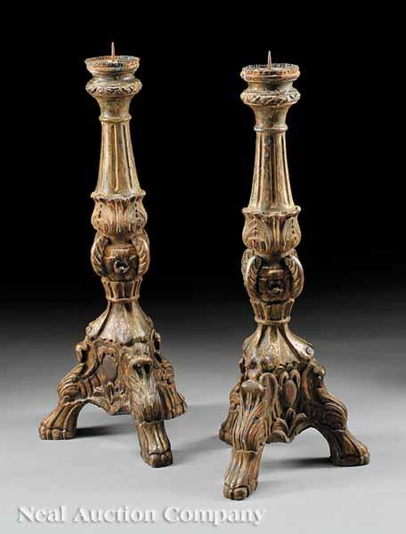 Appraisal: A Pair of Italian Carved and Gilded Prickets late th