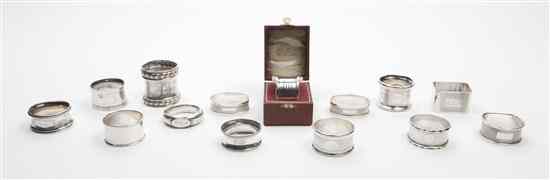 Appraisal: A Collection of Fourteen Silver and Silverplate Napkin Rings comprising