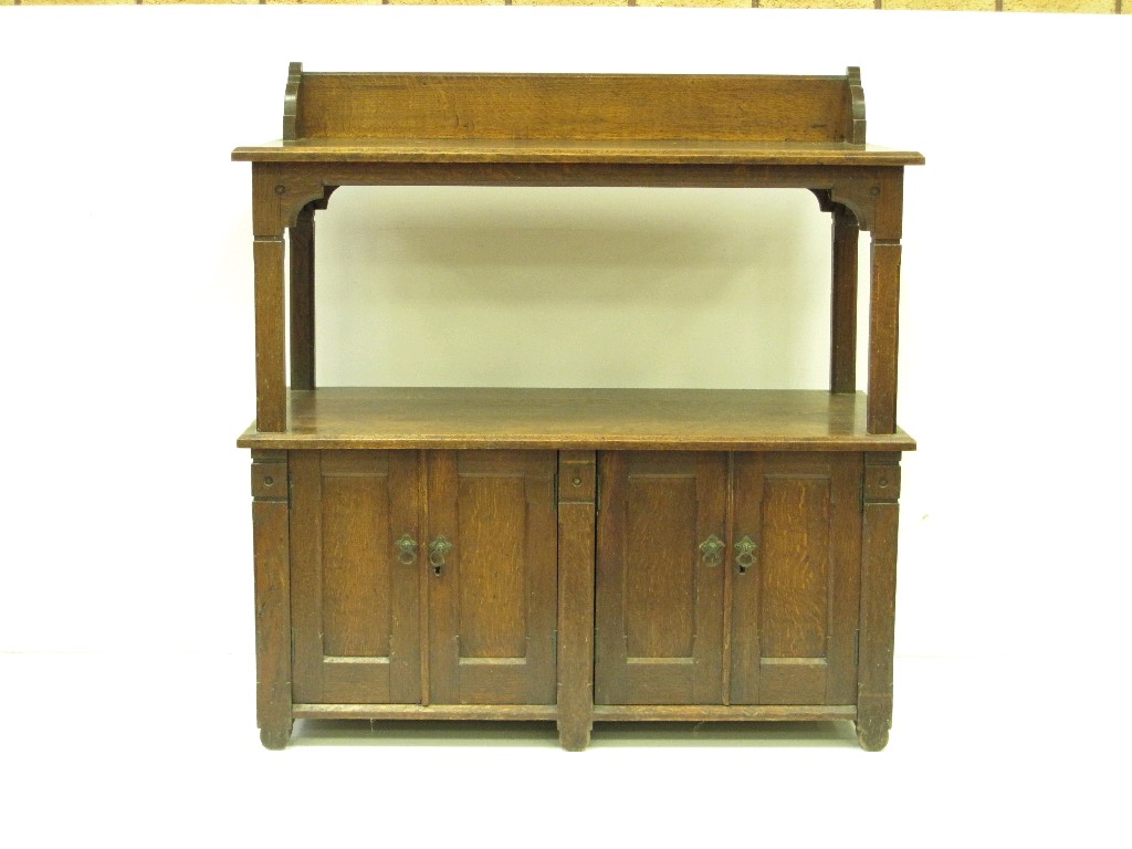 Appraisal: An oak Buffet with low raised back the base fitted