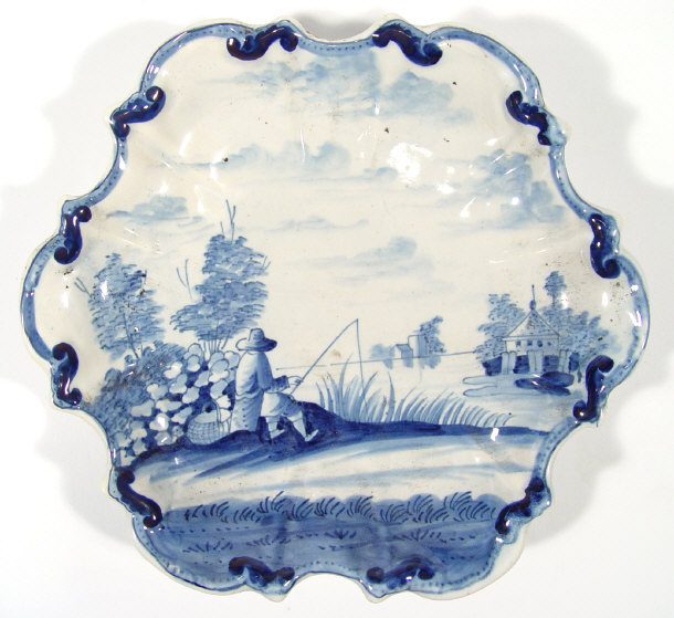 Appraisal: Shaped Delft pottery dish hand painted with a blue fisherman