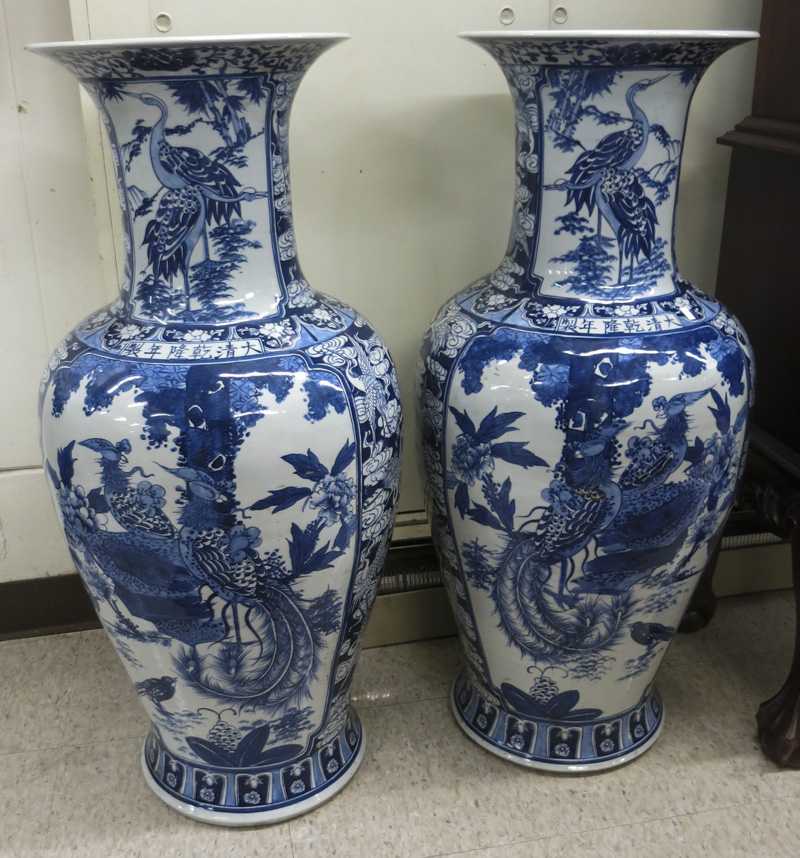 Appraisal: A PAIR OF CHINESE PORCELAIN FLOOR VASES with matching blue