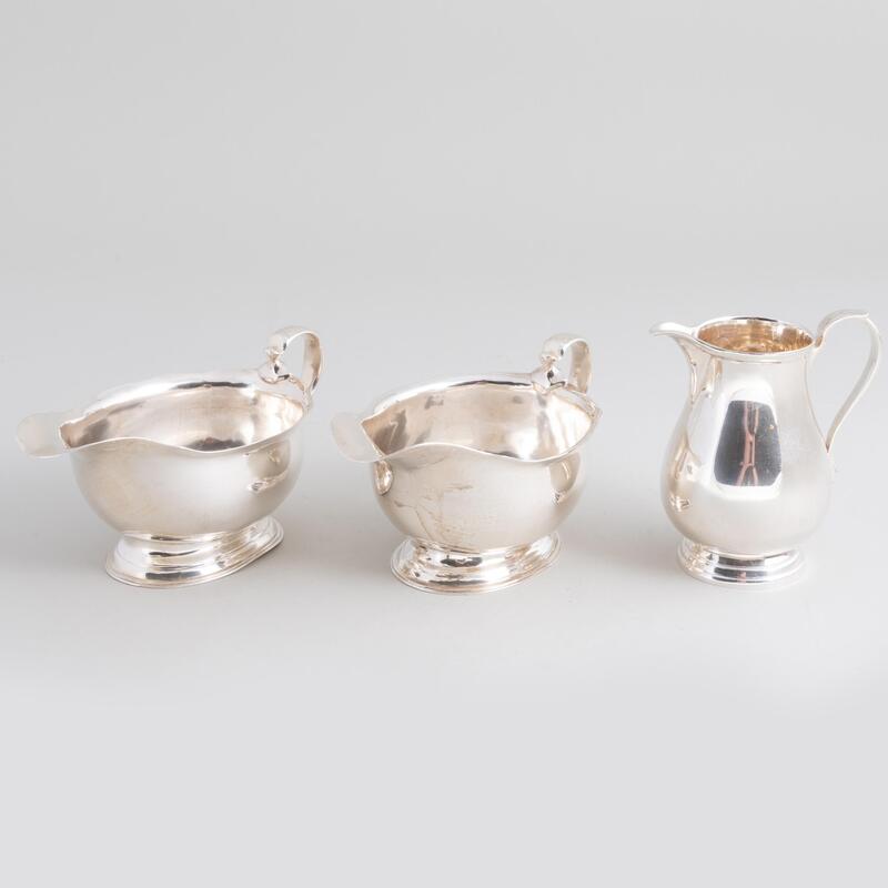 Appraisal: Pair of English Silver Sauce Boats and a Tiffany Co