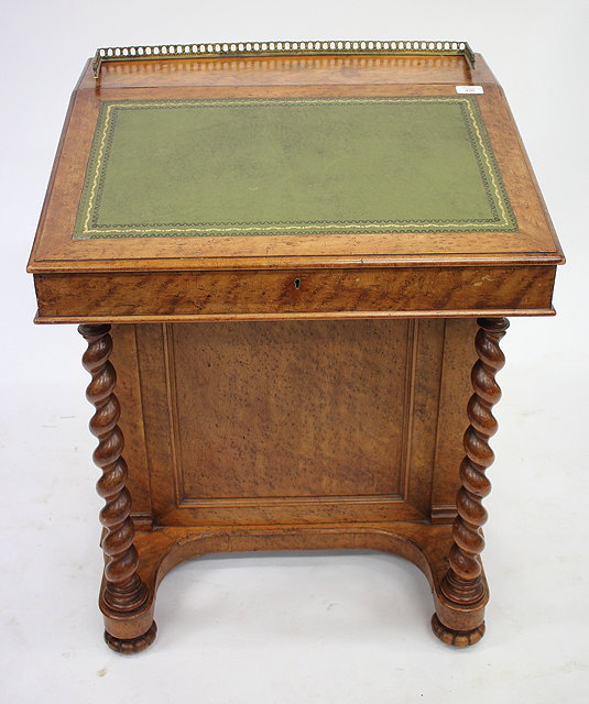 Appraisal: A VICTORIAN BURR MAPLE WOOD DAVENPORT the green leather inset