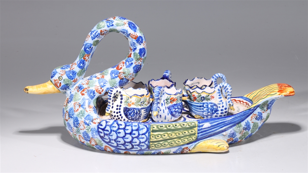 Appraisal: French faience swan server set with seven cups by Qumiper