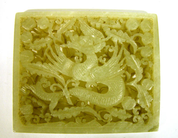 Appraisal: Rectangular green jade panel carved with a dragon amongst leaves