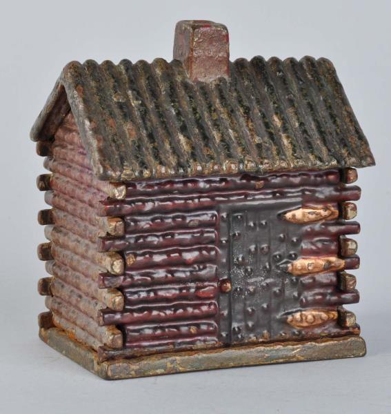 Appraisal: Log Cabin Cast Iron Still Bank Manufactured by Kyser Rex