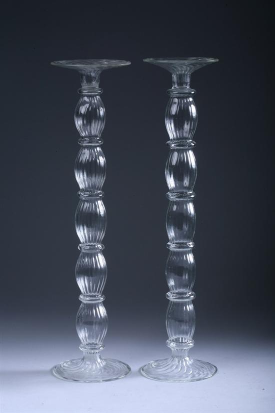 Appraisal: PAIR ITALIAN HAND-BLOWN CLEAR GLASS CANDLESTICKS Artist signed for Tiffany