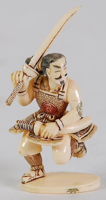 Appraisal: TWENTIETH CENTURY JAPANESE CARVED AND INCISED IVORY OKIMONO of a