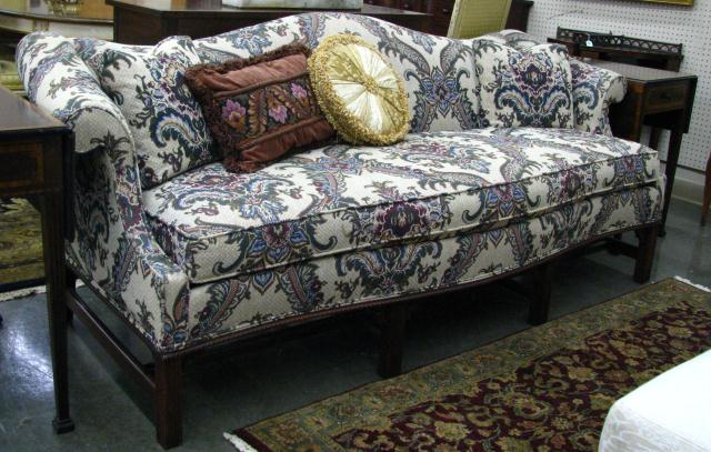 Appraisal: Chinese Chippendale style sofa single cushion seat mahogany base two