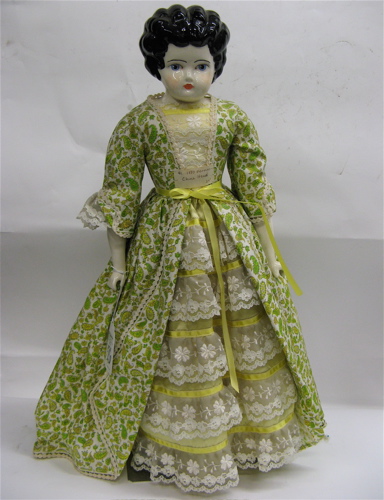 Appraisal: GERMAN CHINA HEAD DOLL H black curly molded hair painted