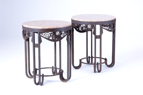 Appraisal: PAUL KISS Pair of wrought-iron side tables with pink marble