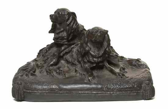 Appraisal: A Continental Bronze Animalier Group depicting two spaniels seated on