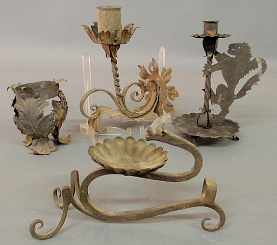 Appraisal: Four th c metal candle holders including a Yellin type