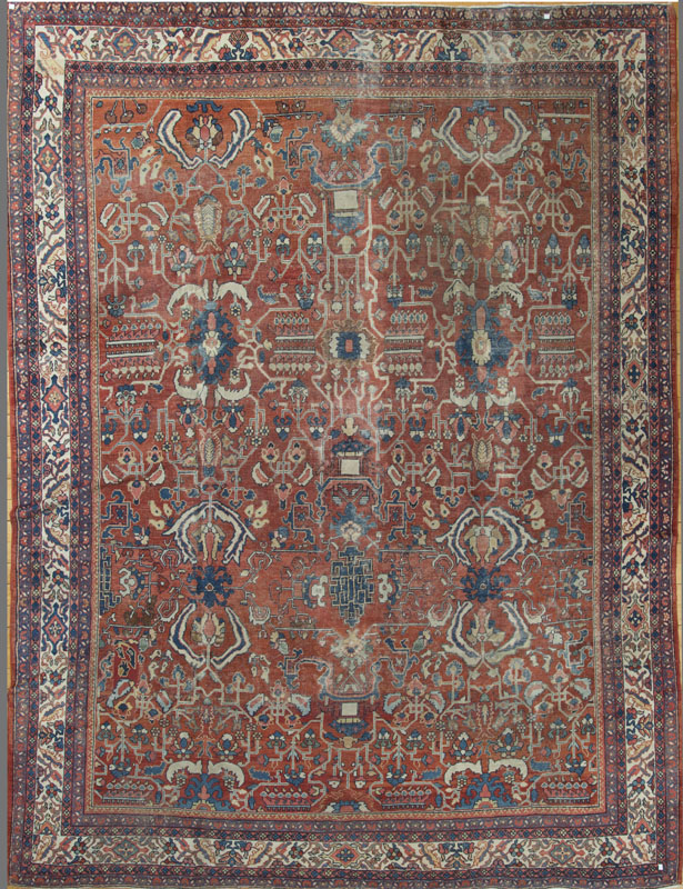 Appraisal: PERSIAN CARPET The terracotta field with floral lattice overlay within