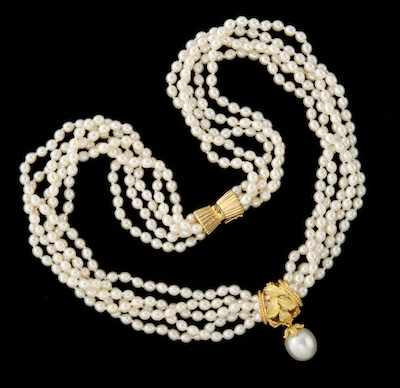 Appraisal: A Ladies' Pearl and Gold South Sea Pearl Slider Torsade