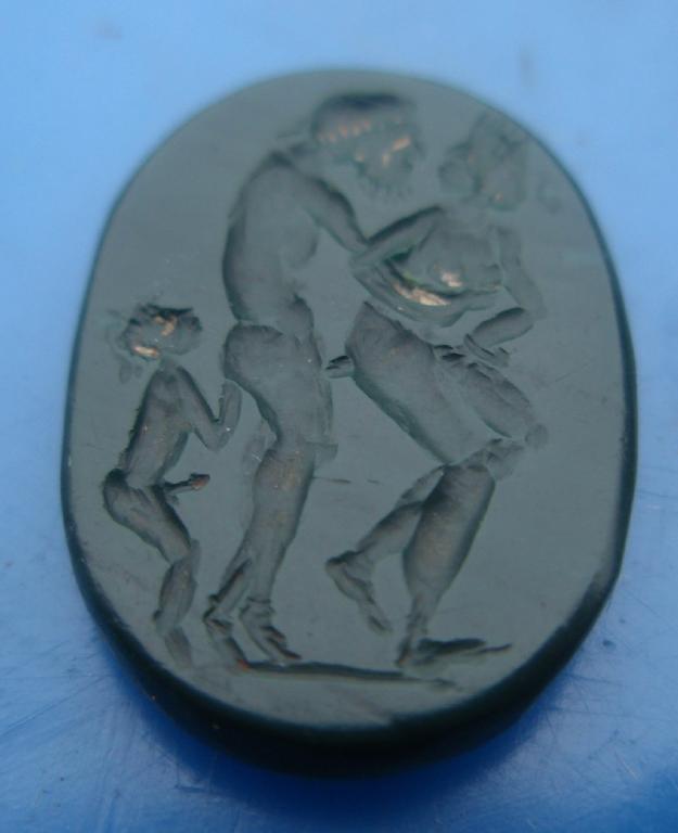 Appraisal: A Roman black hardstone erotic engraved intaglio with a man