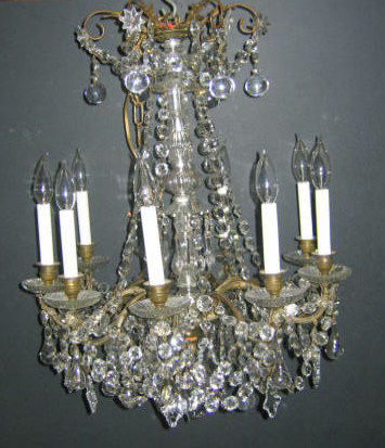 Appraisal: CRYSTAL EIGHT LIGHT PRISMED CHANDELIER Likely Baccarat with gilt metal