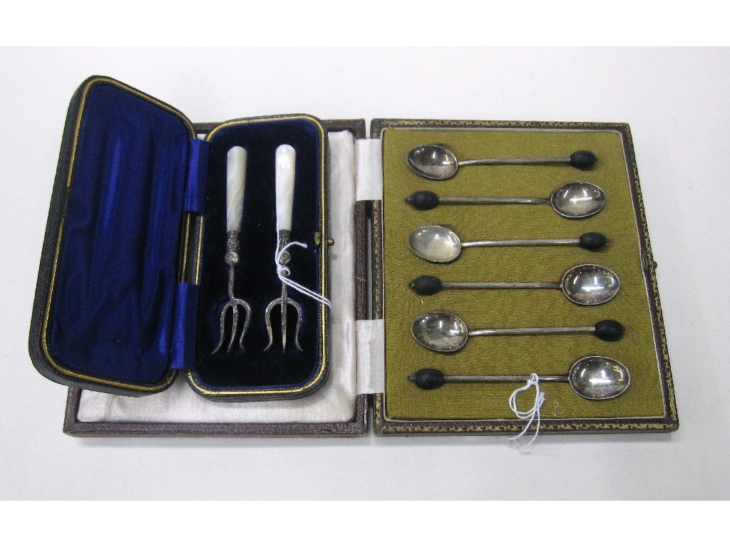 Appraisal: Lot comprising cased set of six silver coffee bean spoons