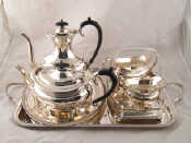 Appraisal: A quantity of silver plate comprising a four piece teaset