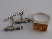 Appraisal: A pair of silver cufflinks designed as paste set bars