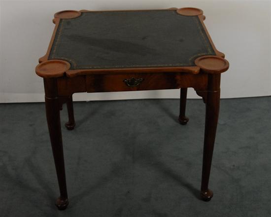 Appraisal: A Leather-top Queen Anne-style Card Table of cherry or walnut