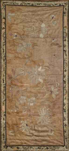 Appraisal: A CHINESE SILK PANEL of flowers within an embroidered border