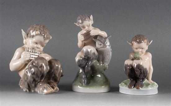 Appraisal: Three Royal Copenhagen porcelain fauns th century faun with frog