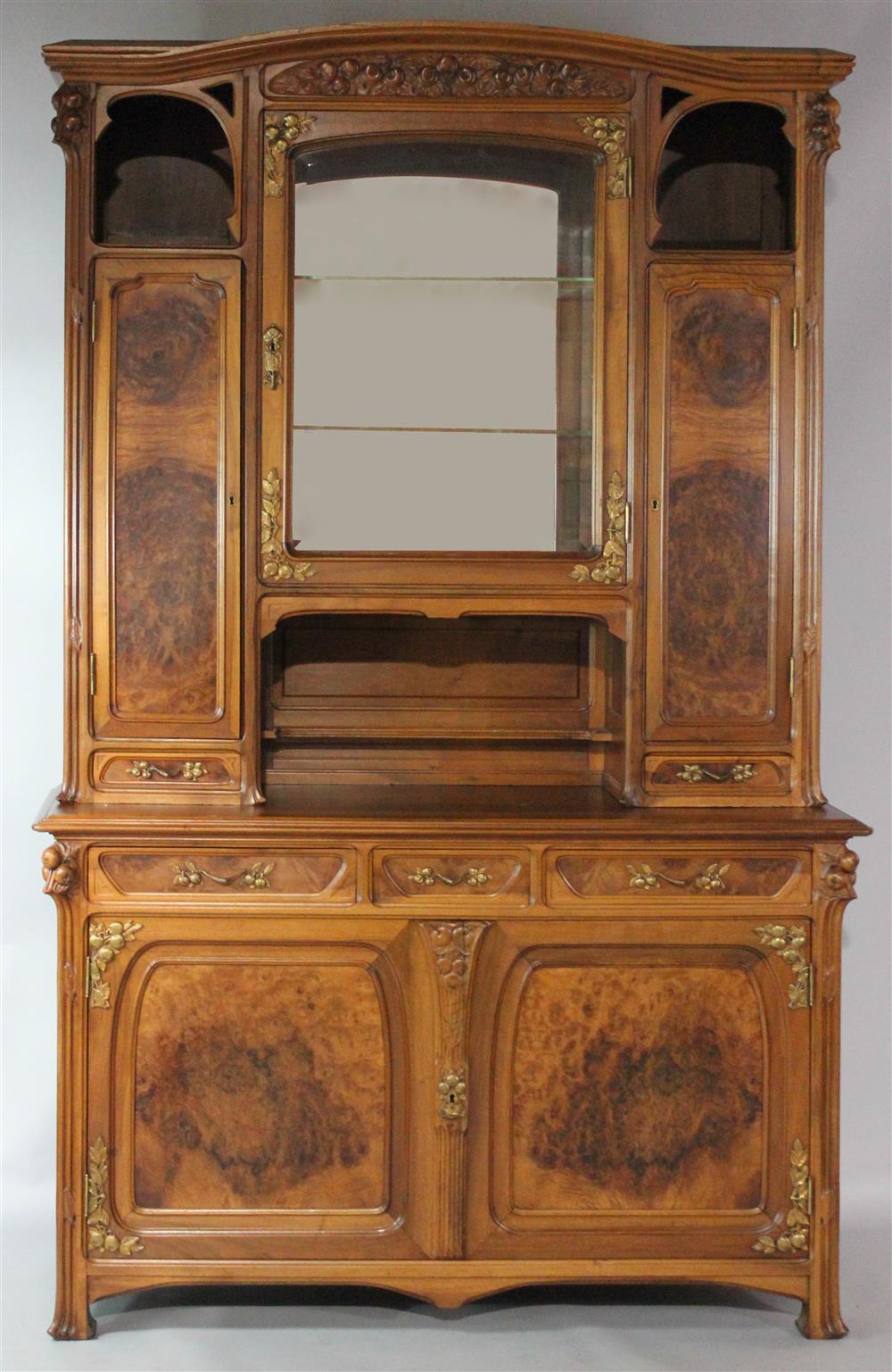 Appraisal: FRENCH ART NOUVEAU CARVED WALNUT BREAKFRONT CABINET in two parts