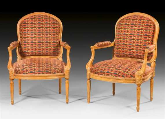 Appraisal: PAIR OF CARVED BEECH FAUTEUILS A LA REINE Louis XVI