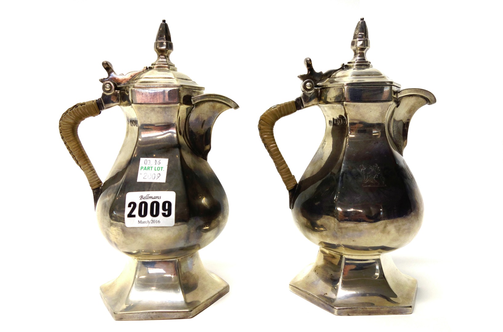 Appraisal: A pair of silver hinge lidded coffee jugs each of