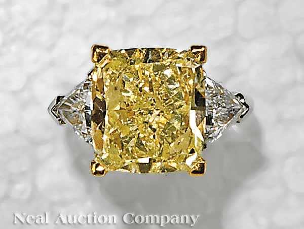 Appraisal: A Platinum and Yellow Radiant-Cut Diamond Ring with White Trilliant