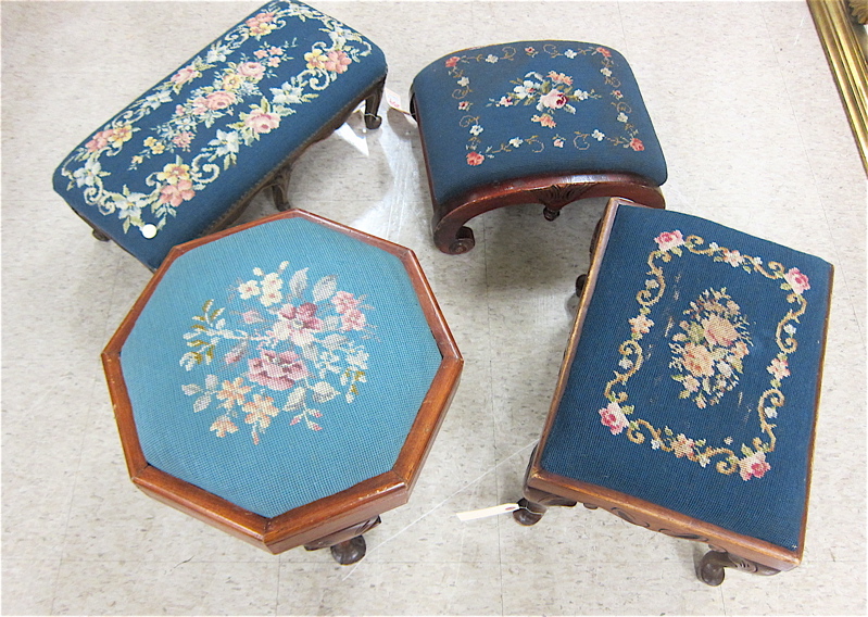 Appraisal: FOUR BLUE NEEDLEPOINT FOOTSTOOLS rectangular Louis XV style with six