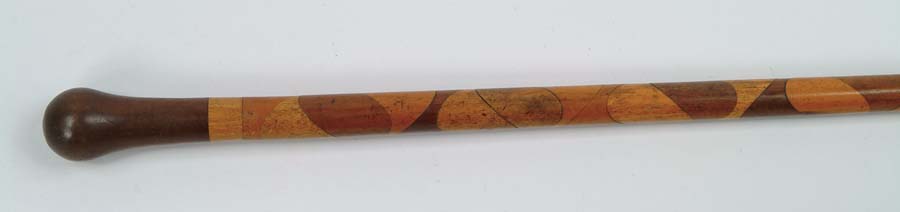 Appraisal: CANE INTERESTING FOLK ART DECORATED CANE Tapered shaft having a