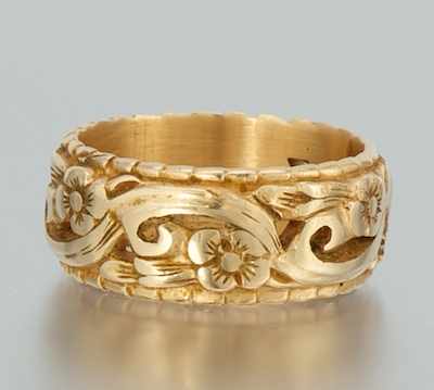 Appraisal: A Ladies' Gold Band k yellow gold band with reticulated