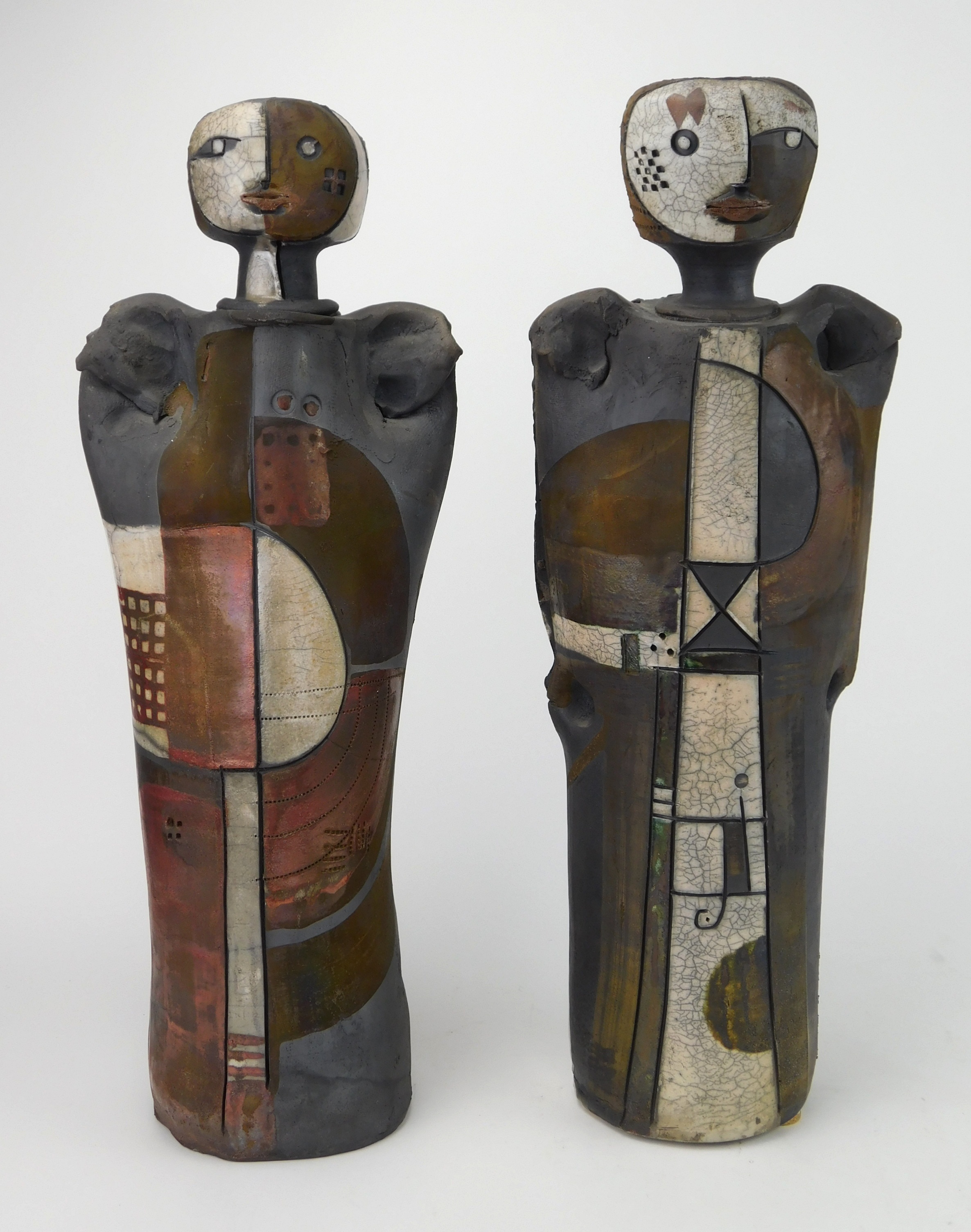 Appraisal: Doug De Lind American - Figures- ceramics sculptures both signed