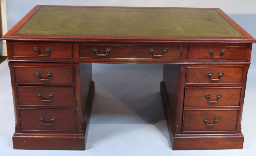 Appraisal: An early thC mahogany twin pedestal writing desk the upper