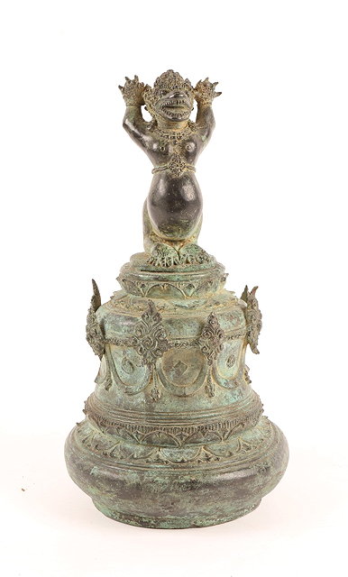 Appraisal: AN EARLY SOUTH EAST ASIAN BRONZE TEMPLE BELL with mythological