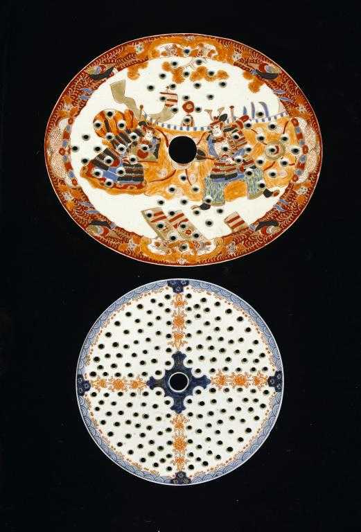 Appraisal: TWO CHINESE EXPORT PORCELAIN DRAINERS one oval the other circular