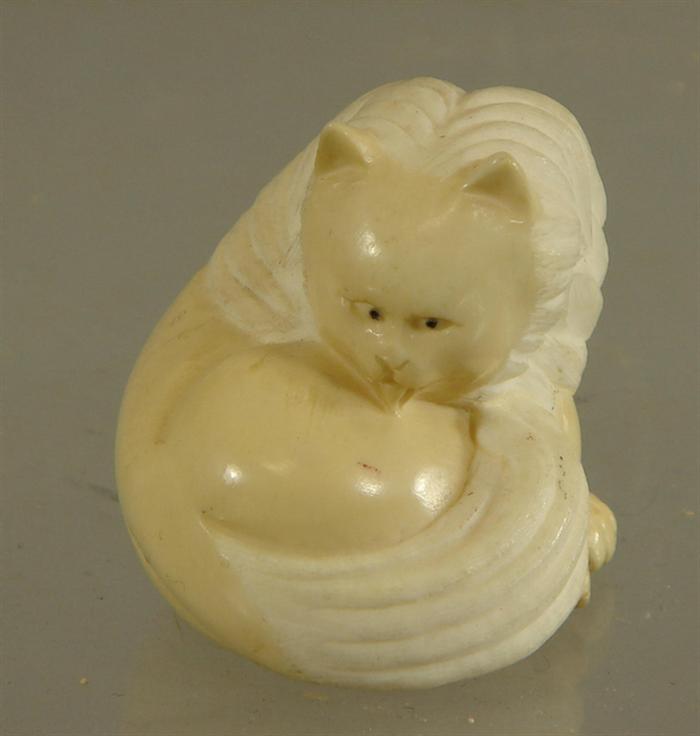 Appraisal: Carved ivory curled cat figure artist signed about h Estimate