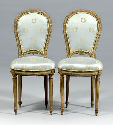 Appraisal: Pair Louis XVI style side chairs carved and painted beechwood