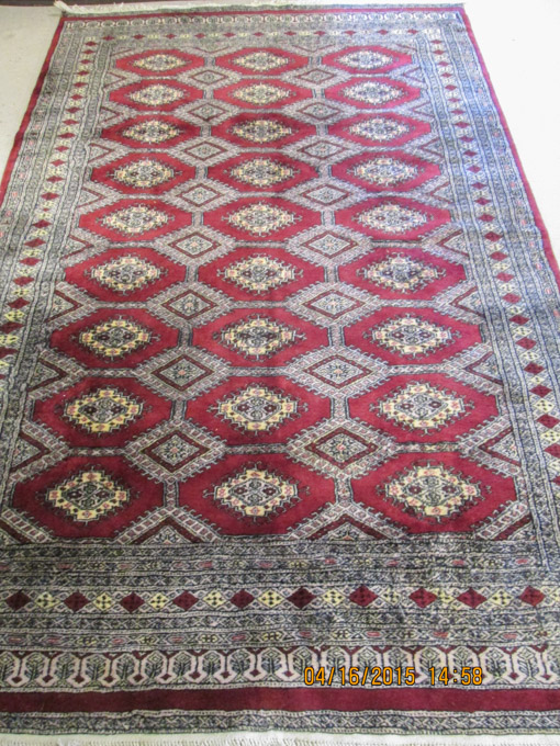 Appraisal: HAND KNOTTED ORIENTAL CARPET Turkoman Bokhara Pakistan or India repeating