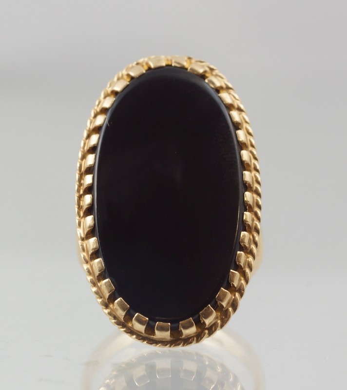 Appraisal: Unmarked K YG and onyx ring l w approximately a