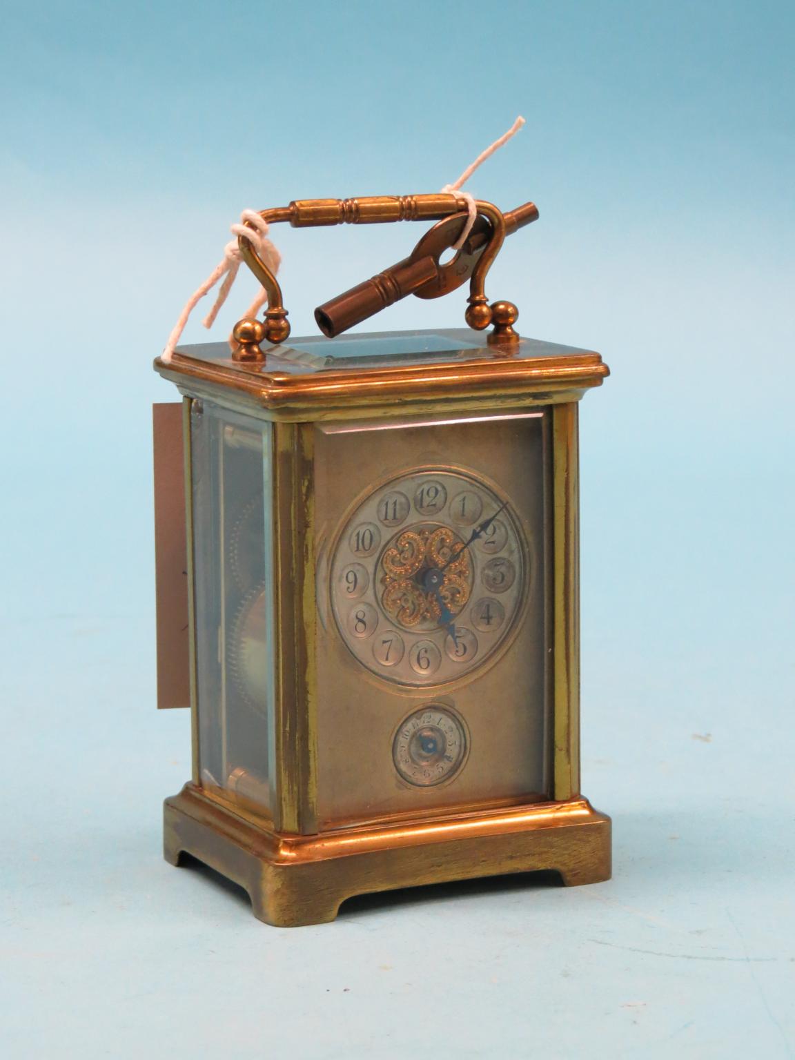 Appraisal: A French brass carriage clock twin-train movement with alarum bell-striking