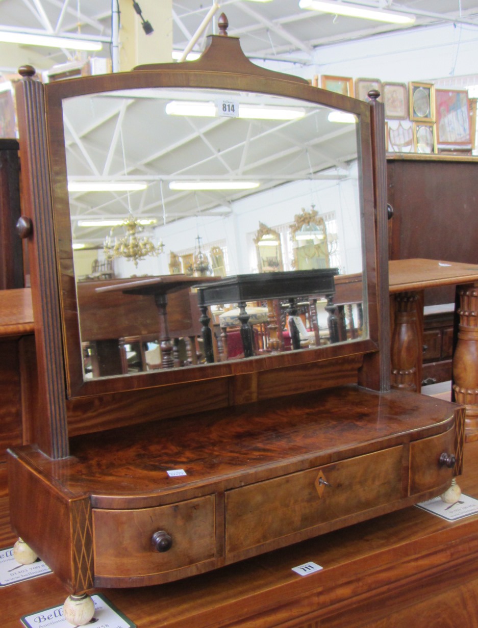 Appraisal: A late Regency inlaid mahogany toilet mirror with bow three