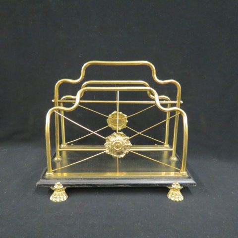 Appraisal: Brass Magazine Rack ebony base lion paw feet x