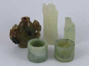 Appraisal: Two Chinese archer's rings a carved jade snuff bottle and