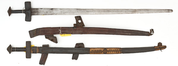 Appraisal: th century and blades Leather covered hilts with iron pommels