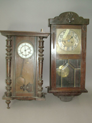 Appraisal: A Continental wooden cased regulator type wall clock the case