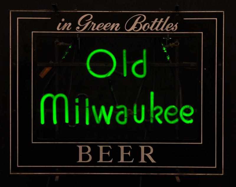 Appraisal: Old Milwaukee Porcelain Bar Sign Description s Green on metal