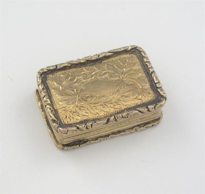 Appraisal: A George IV silvergilt engraved vinaigrette with raised floral borders